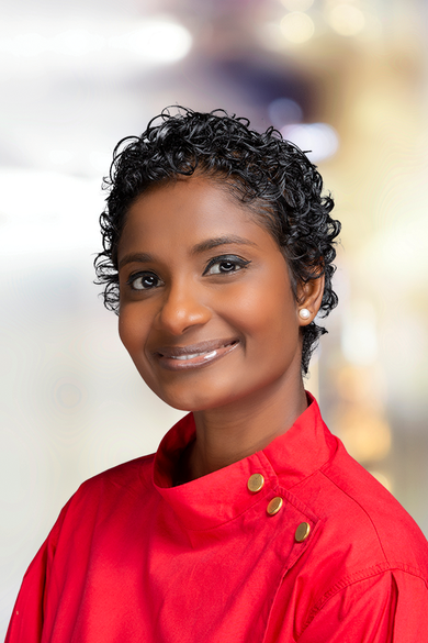 Portrait of Judine Berlus, REALTOR®.